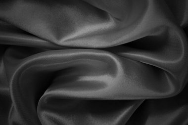 Black grey fabric texture background, detail of silk or linen pattern.