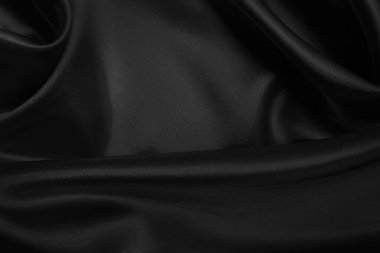 Black grey fabric texture background, detail of silk or linen pattern.