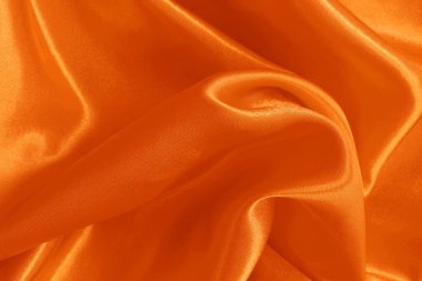 Turuncu kumaş dokusu arkaplanı, ipeğin veya keten deseninin ayrıntıları.