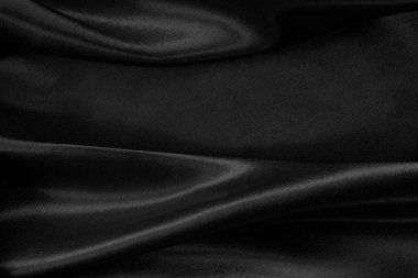 Black grey fabric texture background, detail of silk or linen pattern.