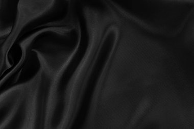 Black grey fabric texture background, detail of silk or linen pattern.