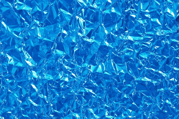 折皱波纹包装纸的新蓝箔纹理背景 — 图库照片#