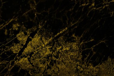 Siyah ve altın mermer, pürüzsüz parıltı desenli arka plan, doğal desenli fayans taşı zemininin karşı görüntüsü..