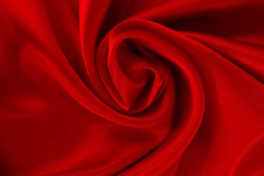 Koyu kırmızı kumaş dokusu arka plan, ipeğin veya keten deseninin ayrıntıları.