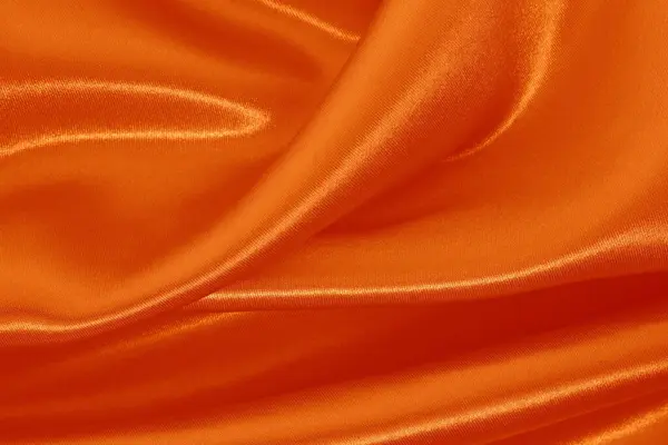 stock image Orange fabric texture background, detail of silk or linen pattern.