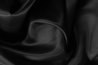 Black grey fabric texture background, detail of silk or linen pattern.