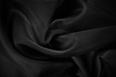 Black grey fabric texture background, detail of silk or linen pattern.