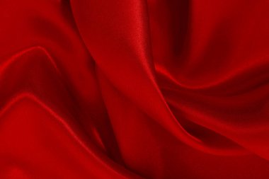 Koyu kırmızı kumaş dokusu arka plan, ipeğin veya keten deseninin ayrıntıları.