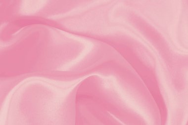 Yumuşak pembe kumaş dokusu arkaplanı, ipeğin veya keten deseninin ayrıntıları.