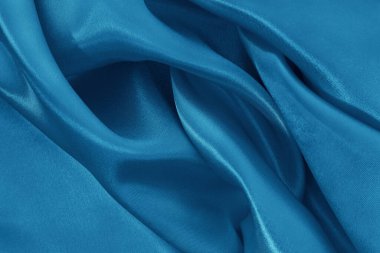 Koyu mavi kumaş dokusu arka plan, ipeğin veya keten deseninin ayrıntıları.