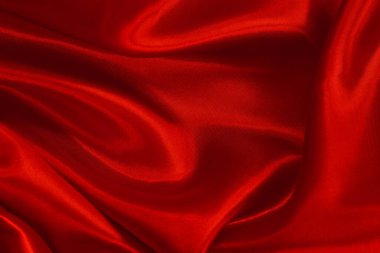 Koyu kırmızı kumaş dokusu arka plan, ipeğin veya keten deseninin ayrıntıları.