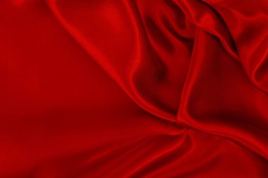 Koyu kırmızı kumaş dokusu arka plan, ipeğin veya keten deseninin ayrıntıları.