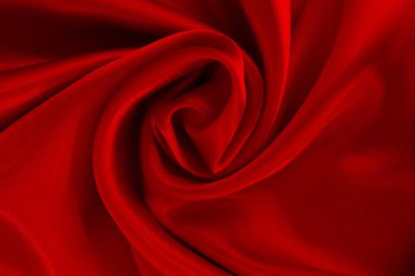 Koyu kırmızı kumaş dokusu arka plan, ipeğin veya keten deseninin ayrıntıları.