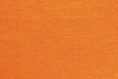 Arka plan için turuncu pamuk kumaş dokusu, doğal tekstil deseni.