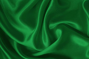 Yeşil zümrüt kumaş dokusu arkaplan, ipeğin veya keten deseninin ayrıntıları.