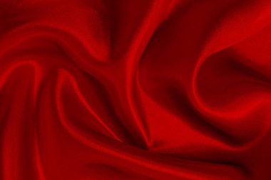 Koyu kırmızı kumaş dokusu arka plan, ipeğin veya keten deseninin ayrıntıları.