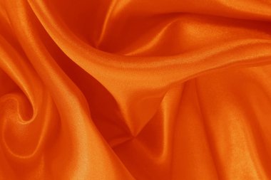 Turuncu kumaş dokusu arkaplanı, ipeğin veya keten deseninin ayrıntıları.