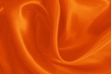 Turuncu kumaş dokusu arkaplanı, ipeğin veya keten deseninin ayrıntıları.