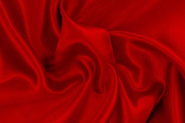 Koyu kırmızı kumaş dokusu arka plan, ipeğin veya keten deseninin ayrıntıları.