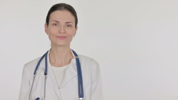 Young Female Doctor Showing Side White Background — Stockvideo