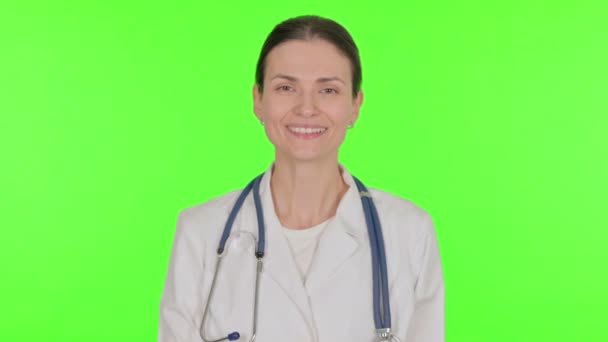 Thumbs Young Female Doctor Green Background — Stockvideo