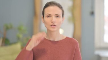 Denying Young Woman Asking to Stop with Hand Gesture