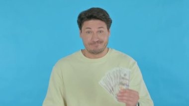Handsome Young Man Counting Dollars at Work, Calculations