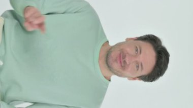 Handsome Young Man with Victory Sign on White Background, Vertical Video