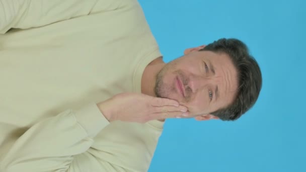 Handsome Young Man Having Toothache Blue Background Vertical Video — Vídeo de stock