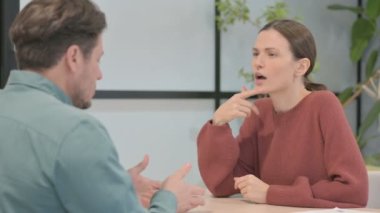 Talking Young People Discussing Work in Office