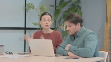 Caucasian Businesswoman Talking with Businessman