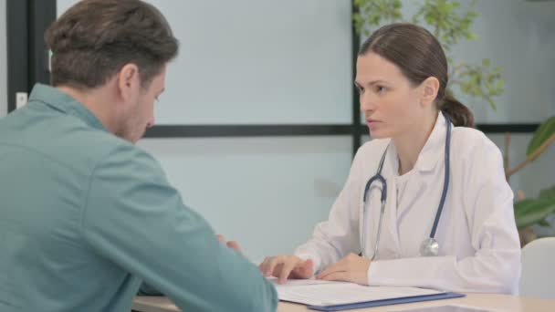 Female Doctor Talking Patient Clinic — стоковое видео
