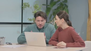 Angry Creative Business People Discussing Problem in Office