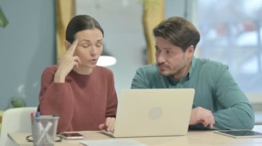 Angry Woman Fighting with Man in Office