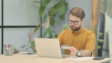 Middle Aged Businessman Unable to make Online Payment on Laptop