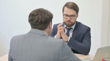 Confident Businessmen Having Talks at Work