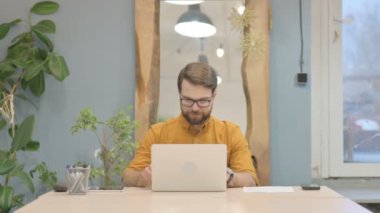 Online Video Chat on Tablet by Middle Aged Businessman