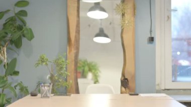 Middle Aged Businessman Coming Back to Office and Opening Laptop