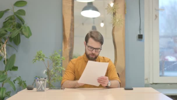 Middle Aged Businessman Reading Documents Work Paperwork — Video