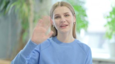 Online Video Chat by Casual Young Woman