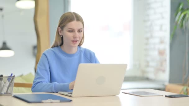 Young Woman Celebrating Online Success Laptop — стоковое видео