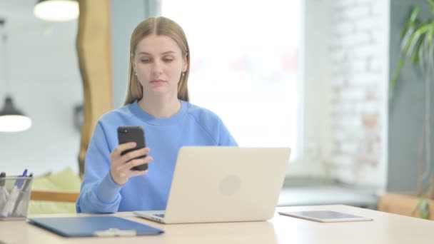 Young Woman Using Phone Laptop Work — Video Stock