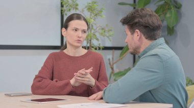 Young Creative Business People Talking in Office