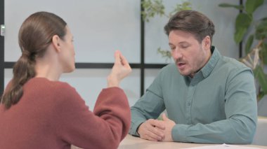 Upset Creative Business People Arguing in Office