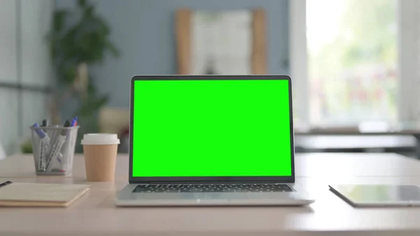 Laptop with Chroma Key Screen on Desk, Green Screen