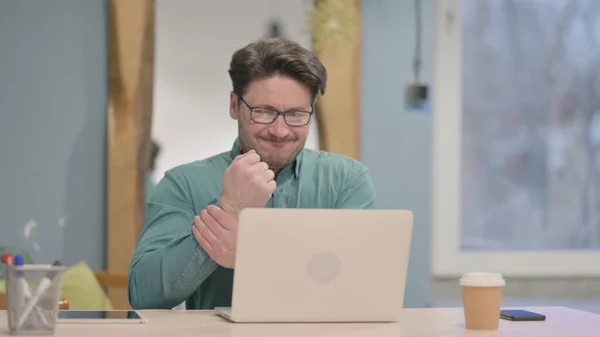 Mature Adult Businessman Having Wrist Pain While Using Laptop — Stockfoto