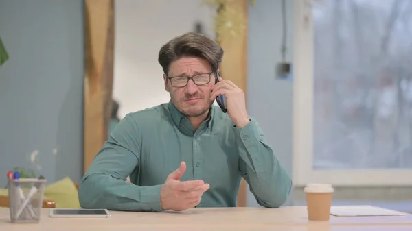 Mature Adult Businessman Talking Phone Office — Stockfoto