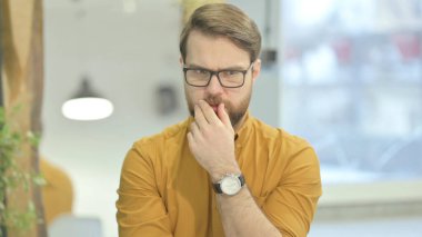 Portrait of Pensive Middle Aged Businessman Thinking New Plan