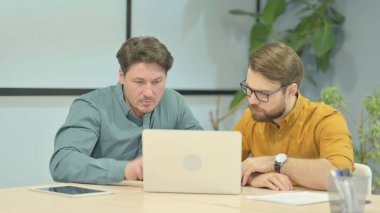 Creative Business People Reacting to Loss at Work