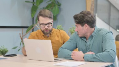 Angry Creative Business People Discussing Problem in Office